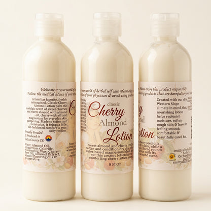 Three bottles of cherry almond lotion